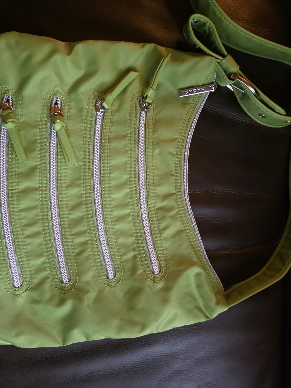 Compact Lime Green Crossbody Bag with Multiple Front Zips